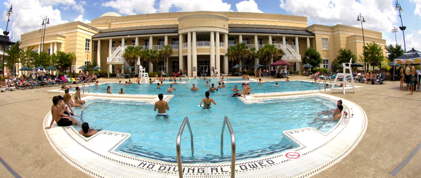 Students enjoy a sunny day in the outdoor pool at the Strom Thurmond Wellness and Fitness Center.