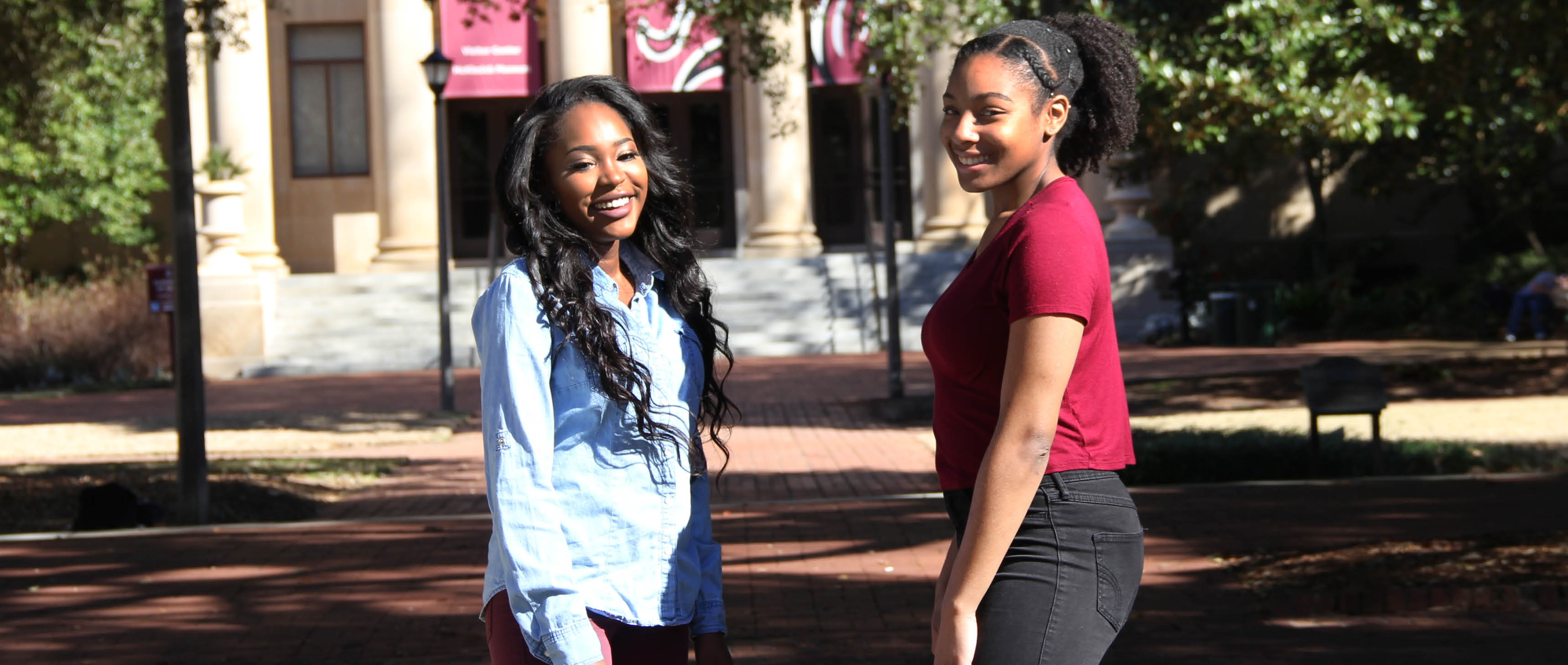 Two Gamecock Gateway female students pose on the Horseshoe