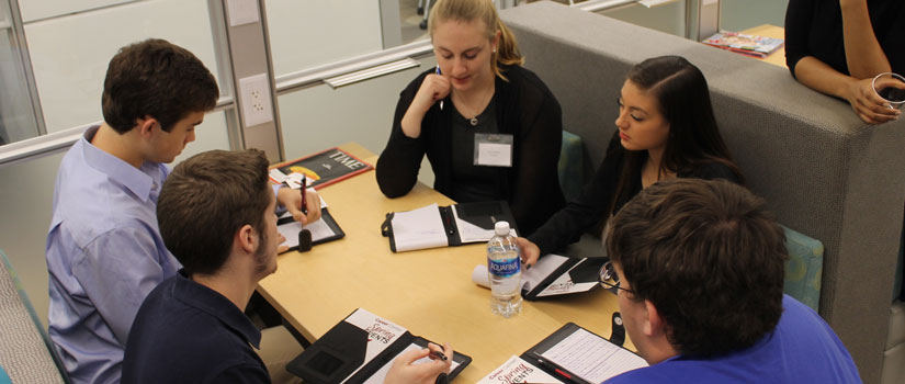 Students meet to discuss student organization business in the Leadership and Service Center.