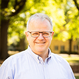 photo of a man smiling outside