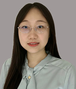 woman smiling with glasses on