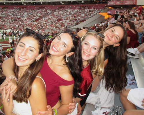 Ainsley Hoffmann and friends at a South Carolina football game.