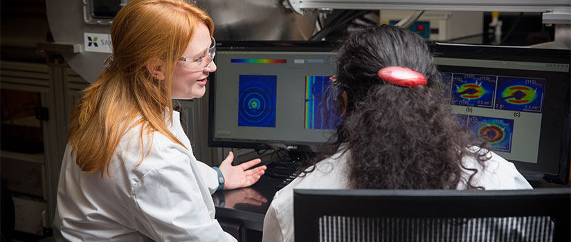 two women in a chemistry lab