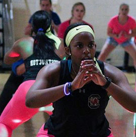 Elizabeth Thompson leads a group exercise class