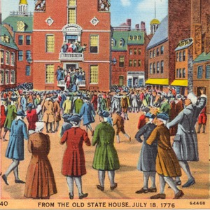 a crowd outside a brick building with speakers on a balcony