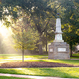 The Maxcy monument stands right of center on the historic Horseshoe, which is green with summer