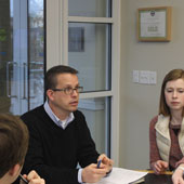 Ed Madden, the new city poet laureate for Columbia, at his day job, talking to students on the first day of the spring semester.